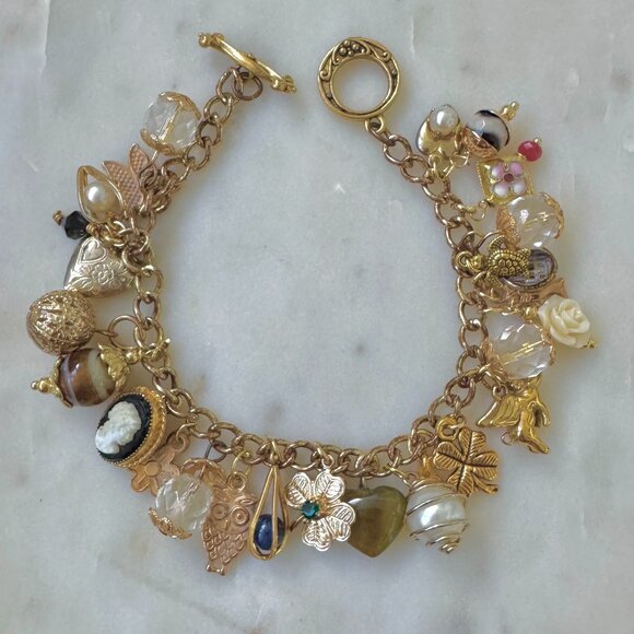 Vintage Charm Bracelet Gold Tone Cameo Pearl Cloverleaf Flower Heart 26 Charms + - Picture 1 of 4